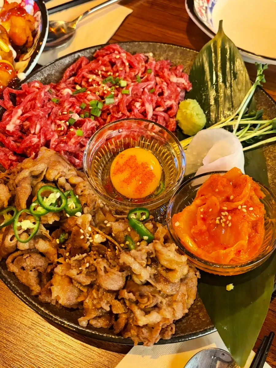 A plate with seared beef and beef tartare together