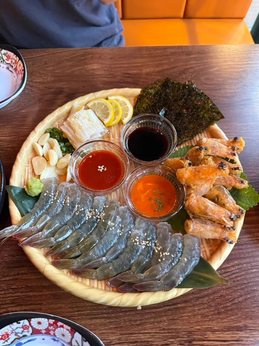 Plate of Sinan same-day-catch raw shrimp sashimi