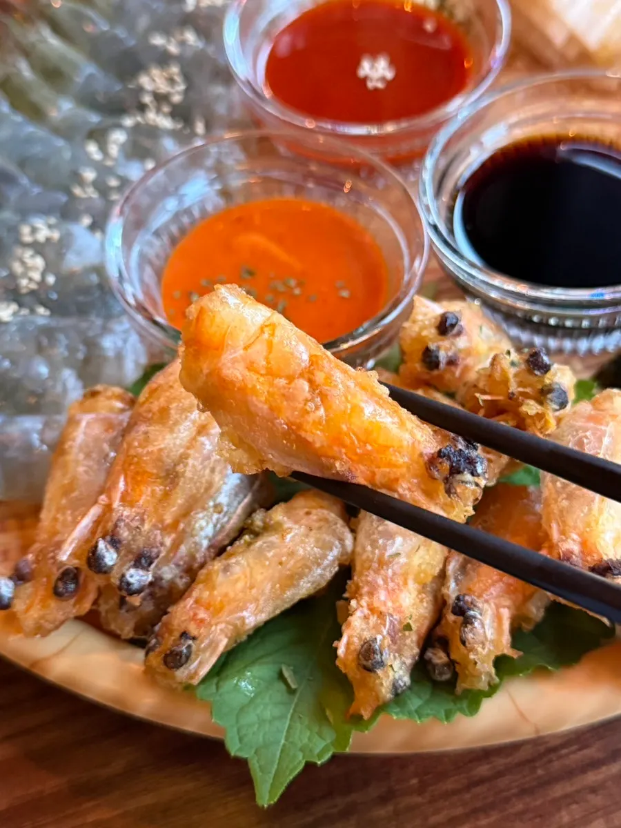 Crispy shrimp heads included in the sashimi serving