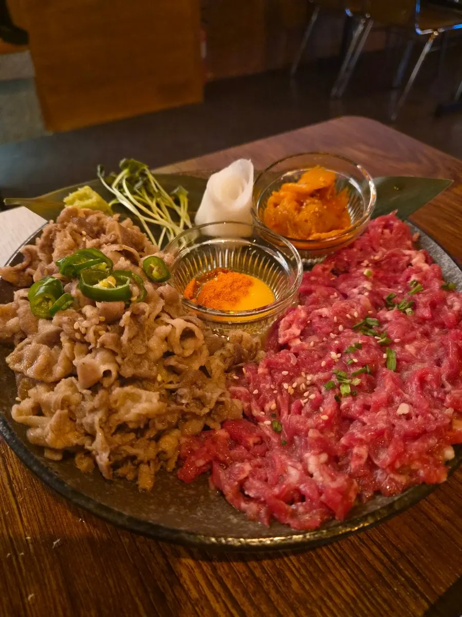 Seared beef and tartare piled on pickled radish