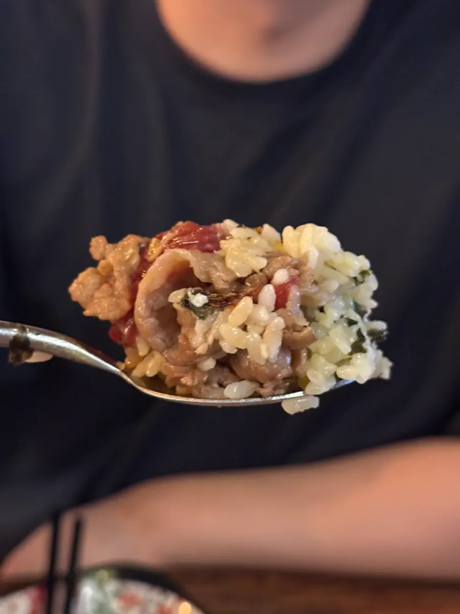 Yukhoe and chadol placed on top of egg rice