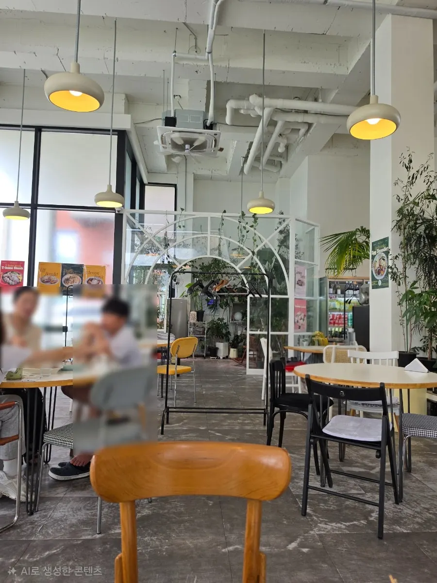 Indoor space at When You Bite decorated with plants