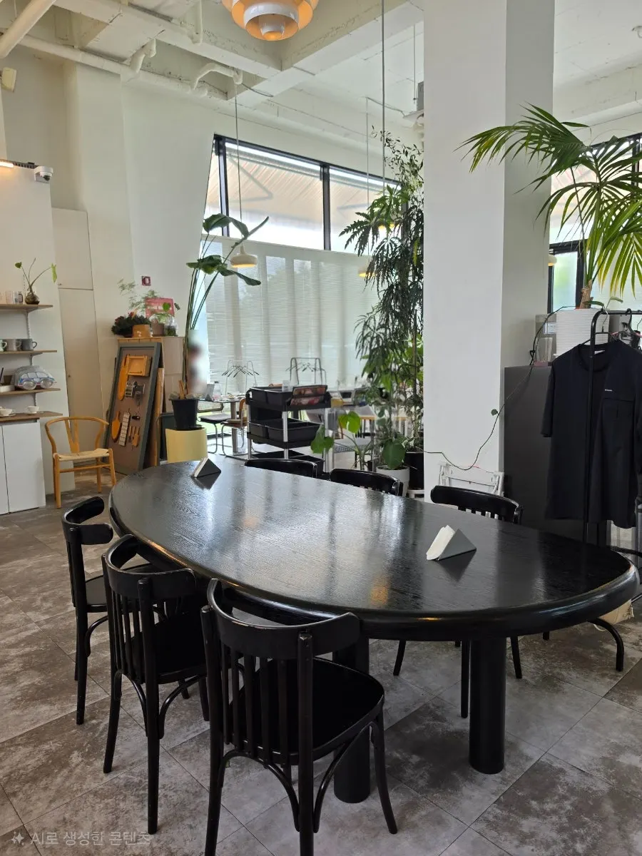 Wide interior view of When You Bite with high ceilings