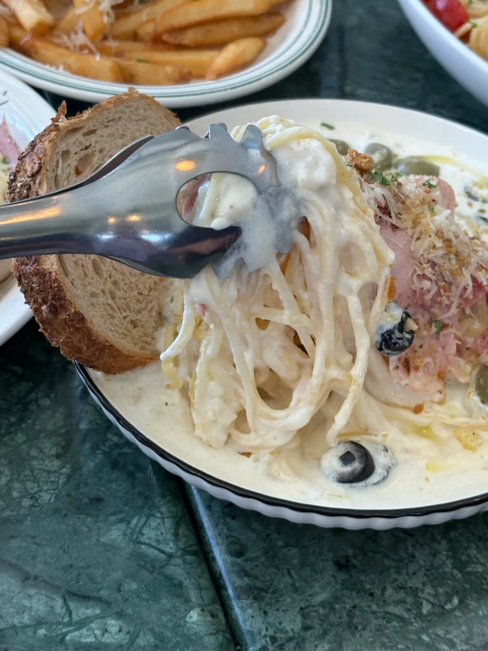 Jambon cream pasta topped with jambon