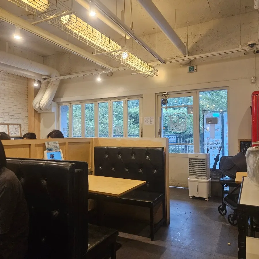 Store interior showing the Gorae Byeoljang drink lineup
