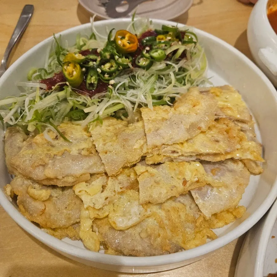 Fried sundae served alongside the tteokbokki