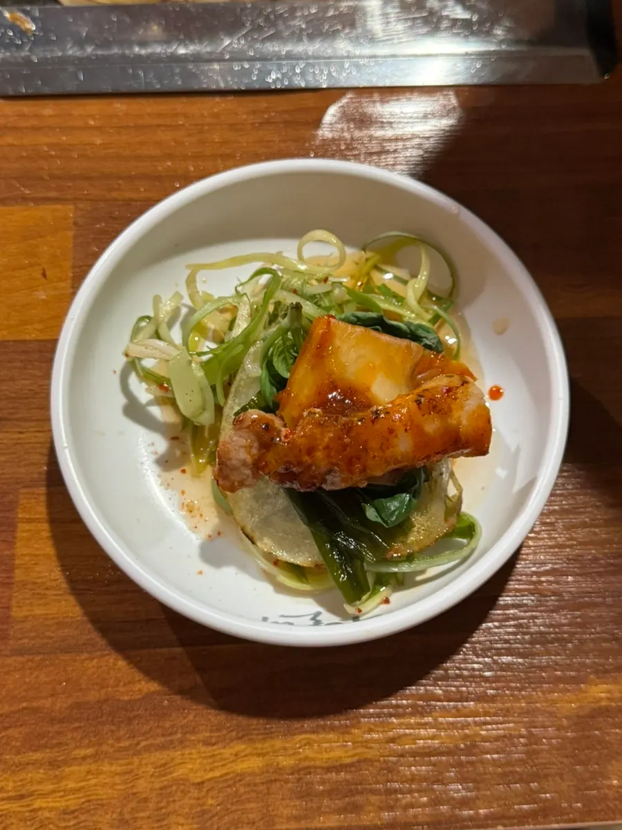 Wrap combo of honey potato, basil, myeongi namul, and fresh-cut kimchi