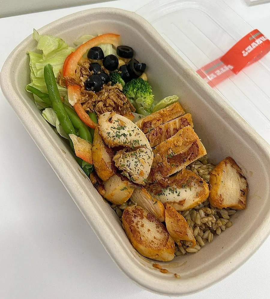 Close-up of the chicken box tofu noodles