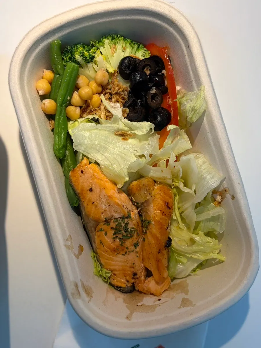 Light protein box with grilled salmon and salad
