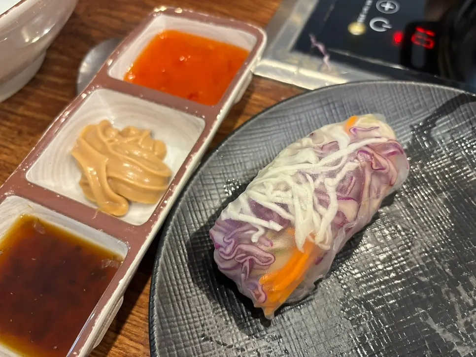 A Vietnamese wrap made with square rice paper