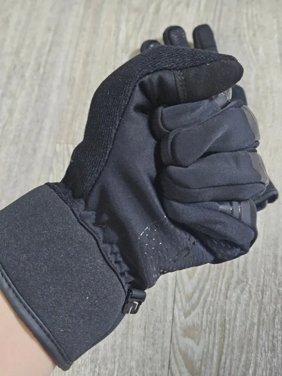 Ski gloves being worn to check finger movement