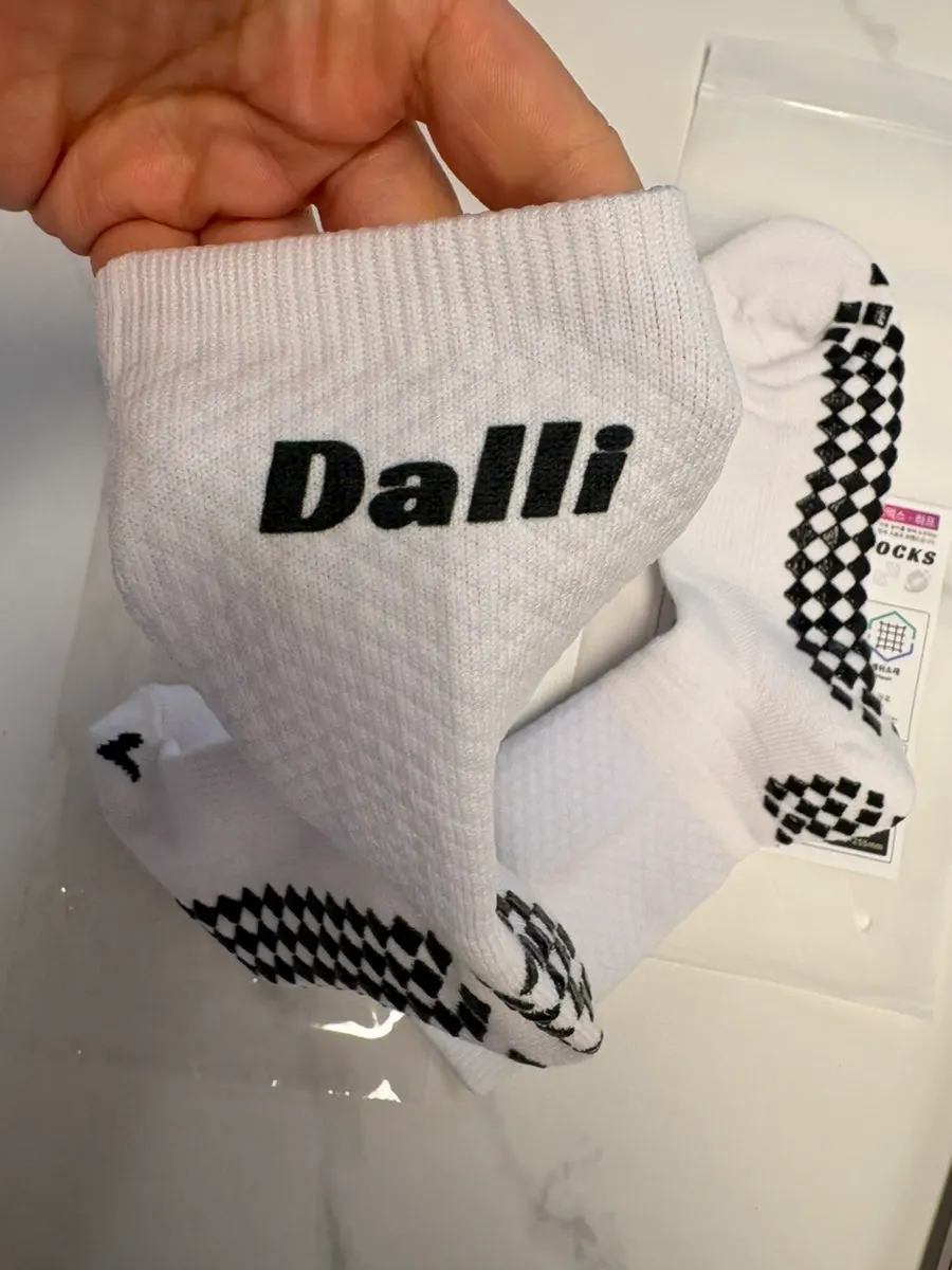 Sports socks with lettering placed in a chosen position