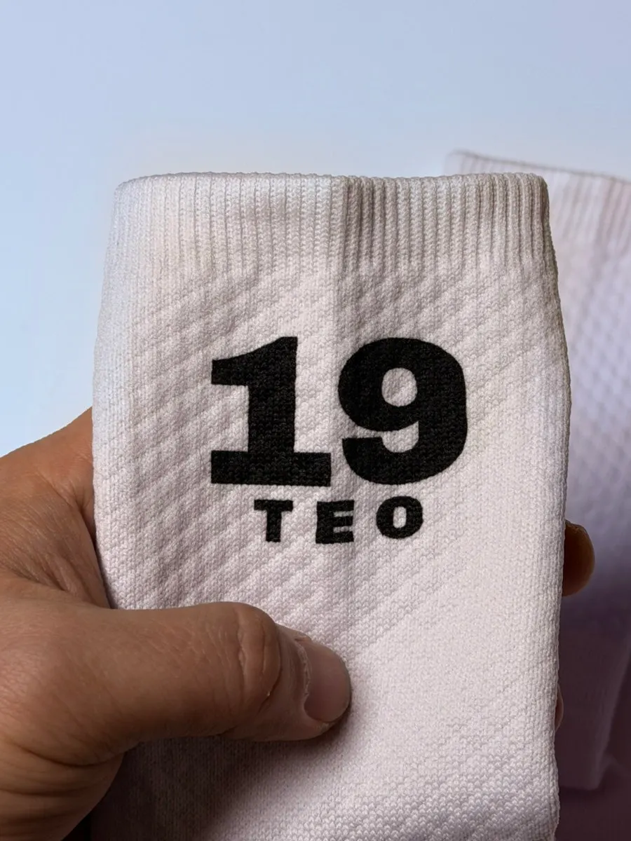 Winable athletic socks with rubberized soles