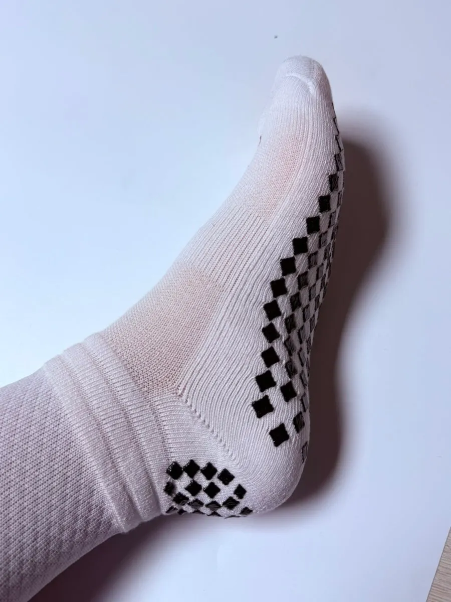 Athletic socks distinguished by personal text and a number