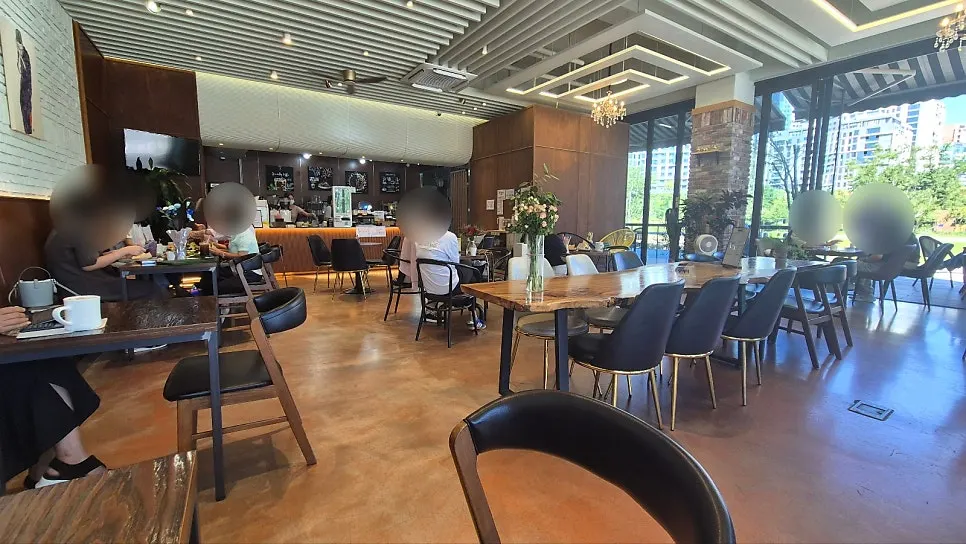 Wood-toned café interior with spacious tables