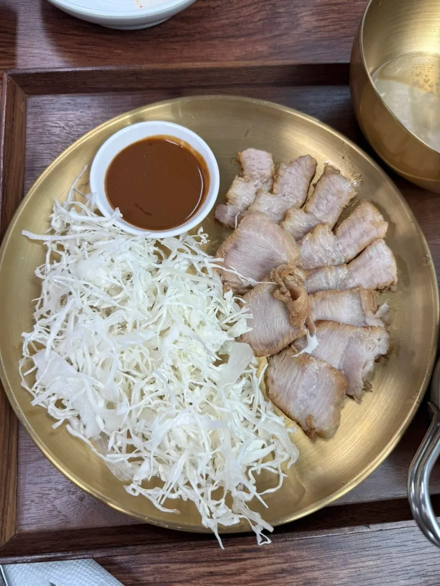 A full spread of spicy shabu-shabu and boiled pork
