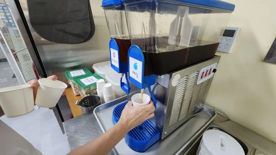 Self-service bar with extra broth and kimchi