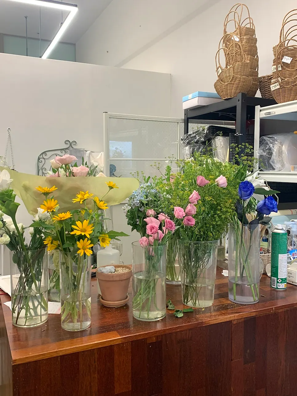 Walking in to pick up flowers after parking in front of the shop