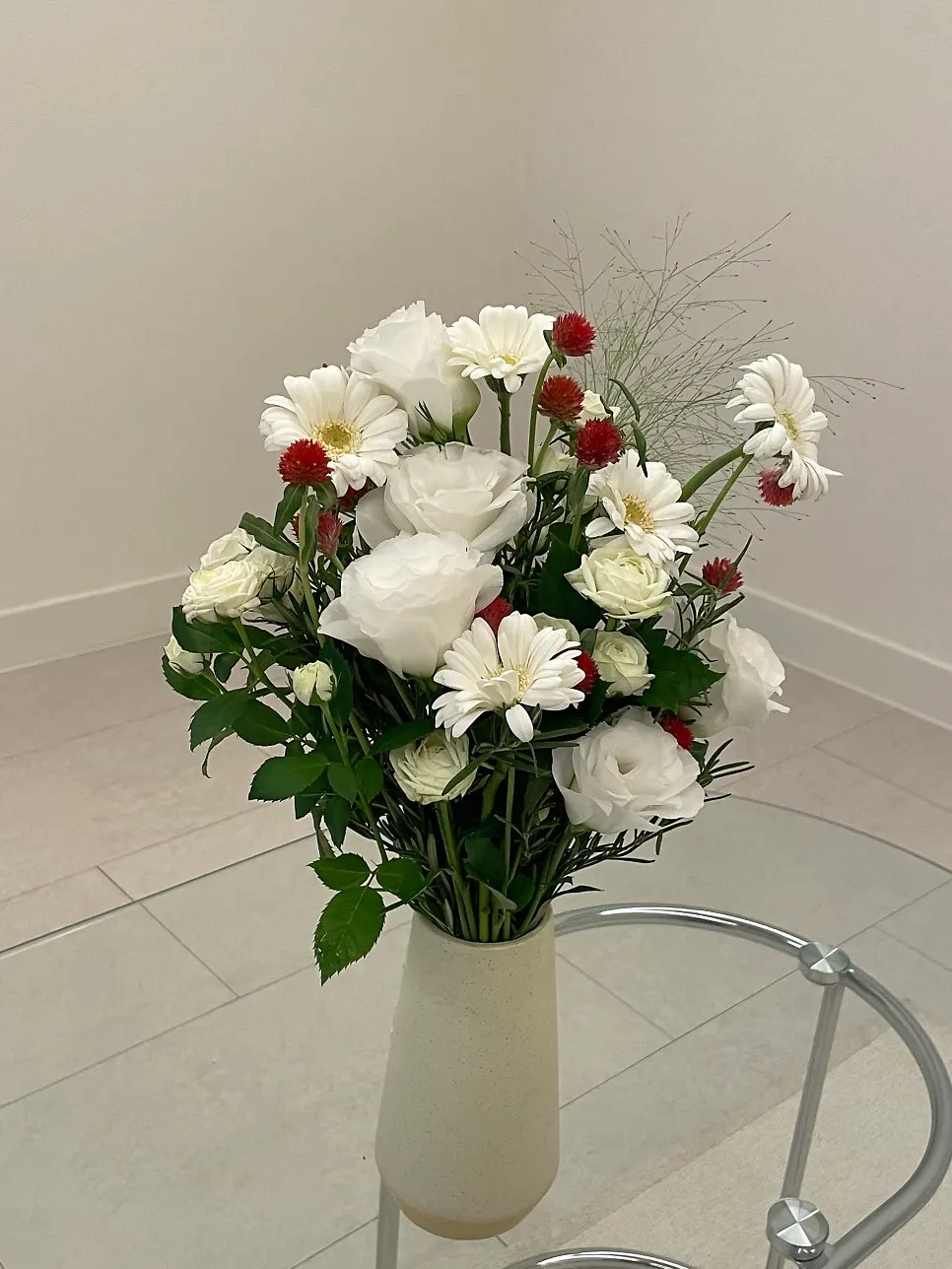 Wedding congratulation bouquet placed together with a cake
