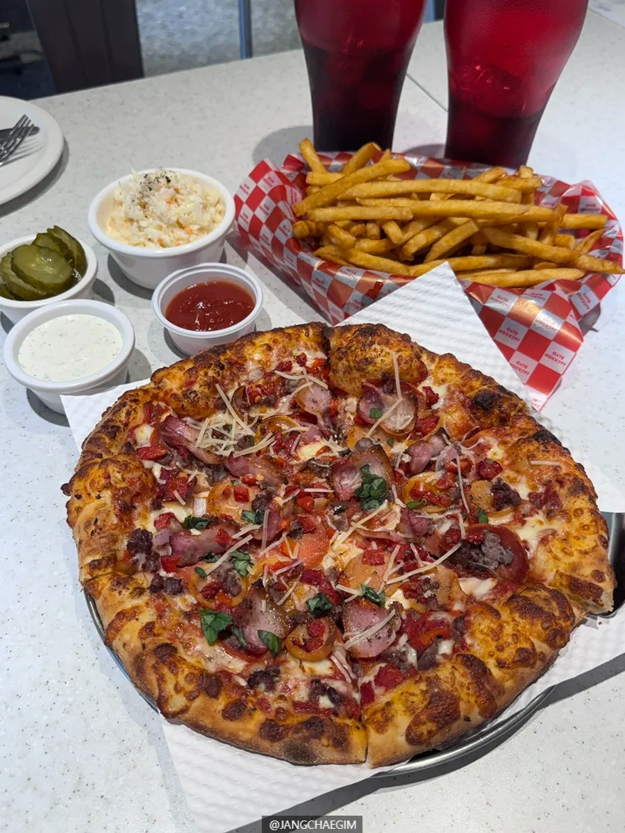 Fries dipped in ketchup