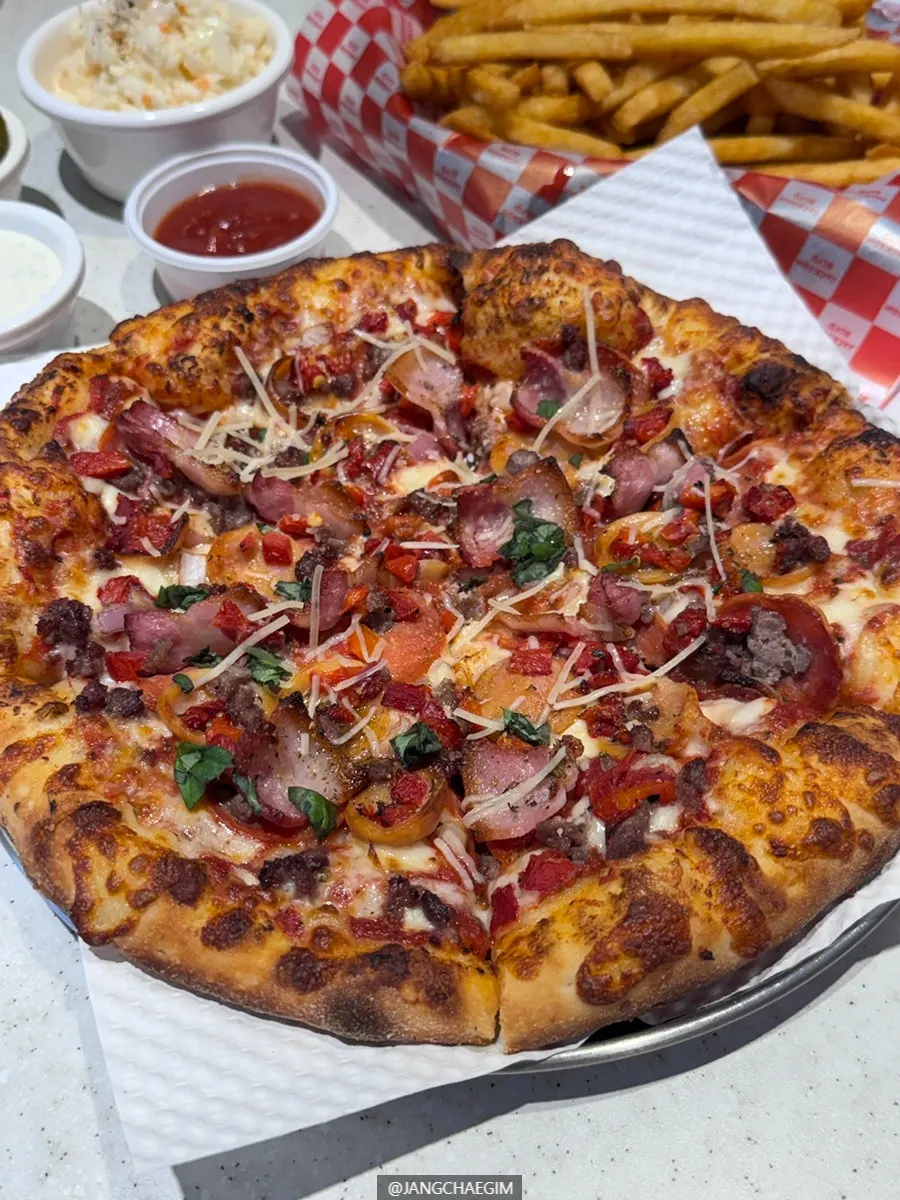 Super Jackson R size pizza and coleslaw spread