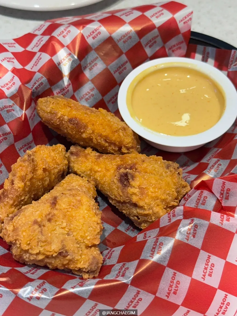 Pizza crust dipped in house ranch sauce