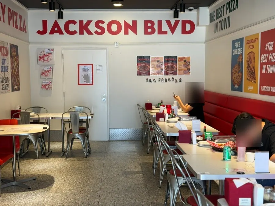 Clean, comfortable interior of Jackson Pizza