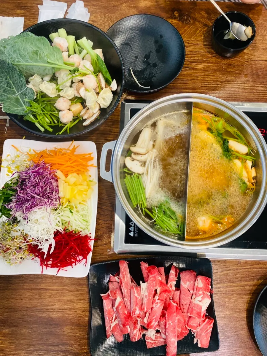 A warm shabu-shabu and Vietnamese rice-paper wrap meal