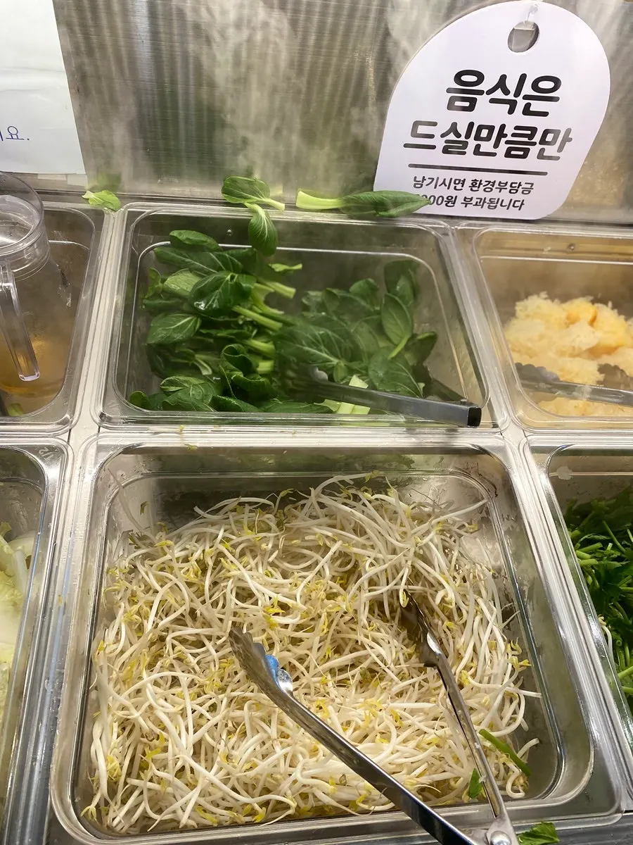 Fresh vegetables and ingredients for Vietnamese rice-paper wraps