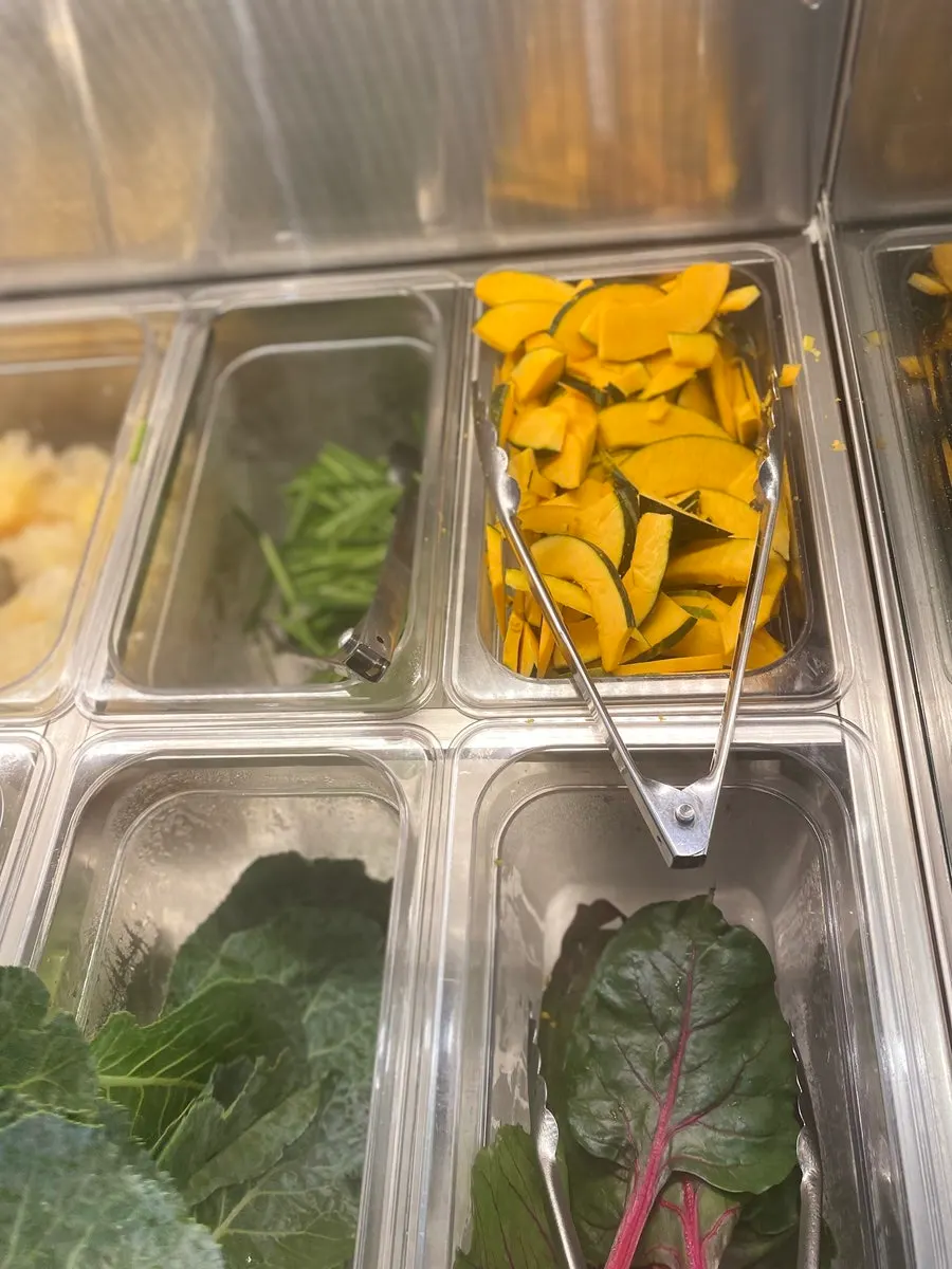 A variety of vegetables prepared for Vietnamese rice-paper wraps