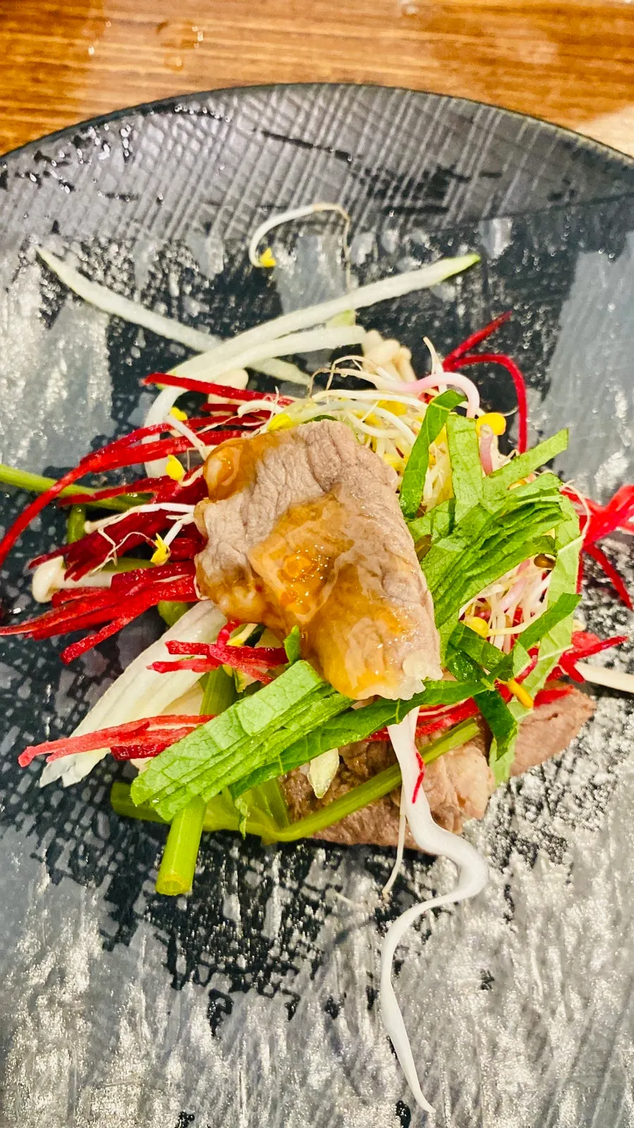 A meal enjoying shabu-shabu and Vietnamese rice-paper wraps together