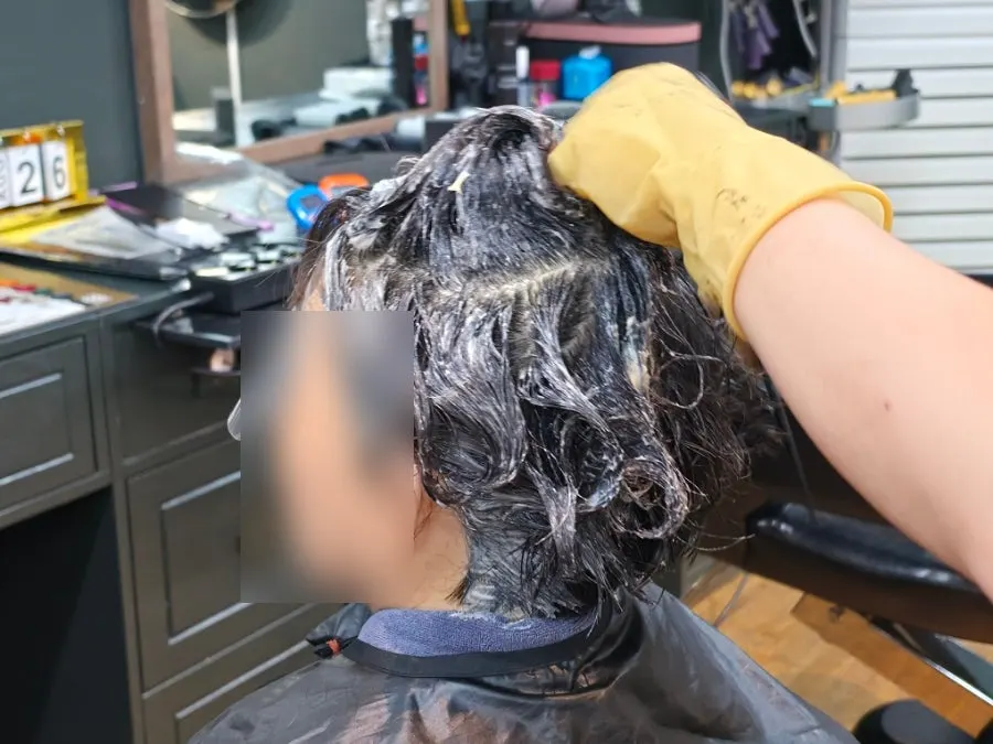 Full dye treatment underway for gray coverage