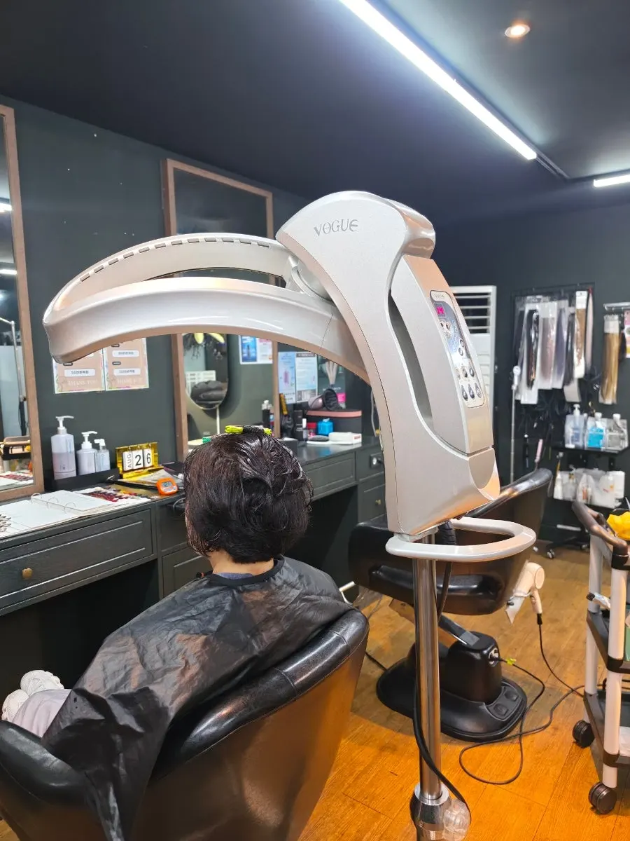 Working the iron through the crown to build volume