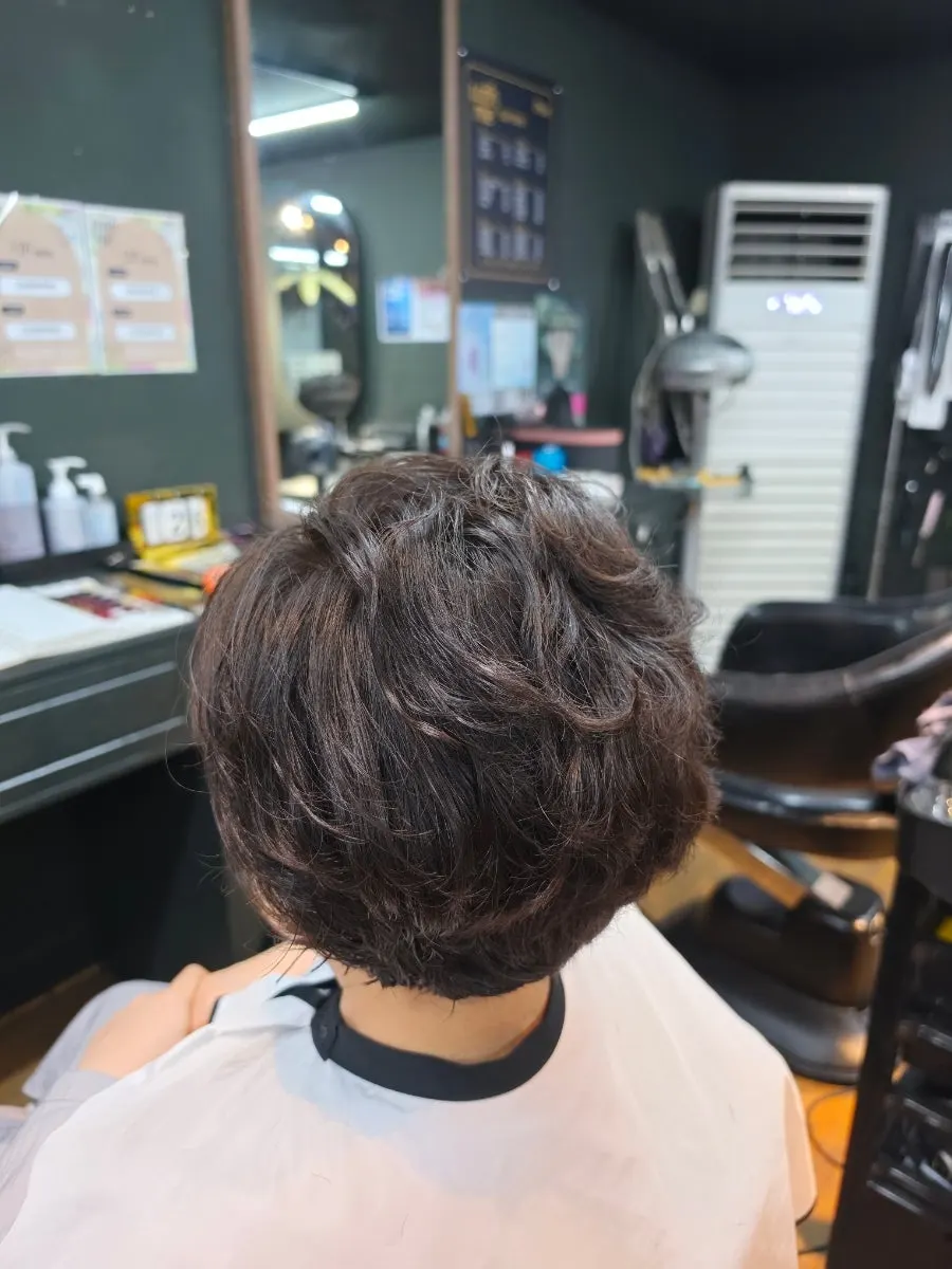 Mom's neatly styled hair after the treatment