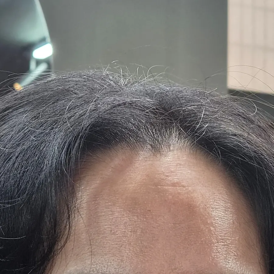 Blow-dried finished look after the iron perm
