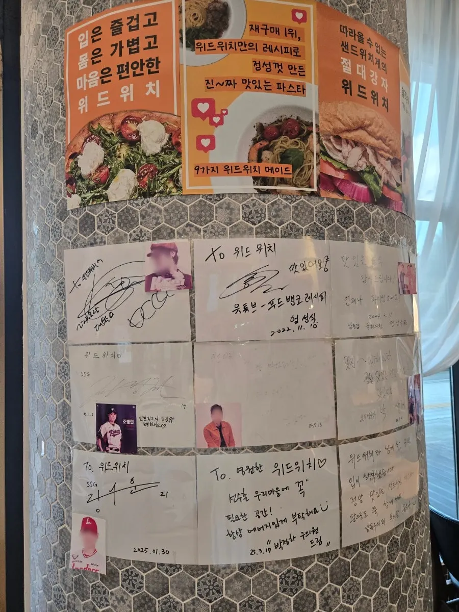 Celebrity autographs displayed on one wall