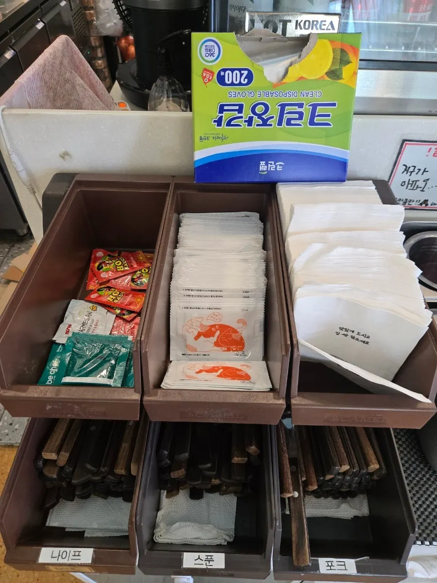 Withwich's self-serve bar with plates and cutlery