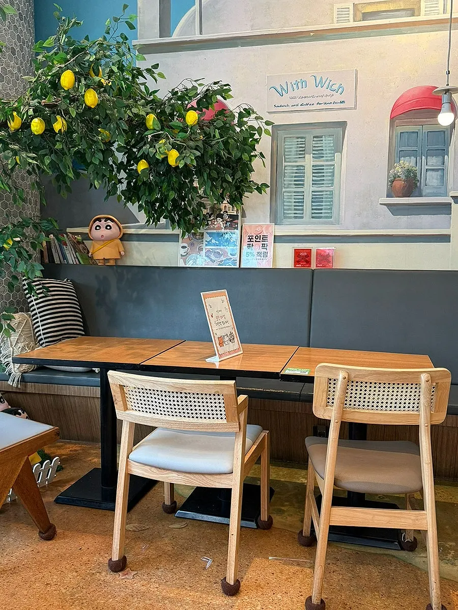 Cushioned chairs at a table inside the restaurant