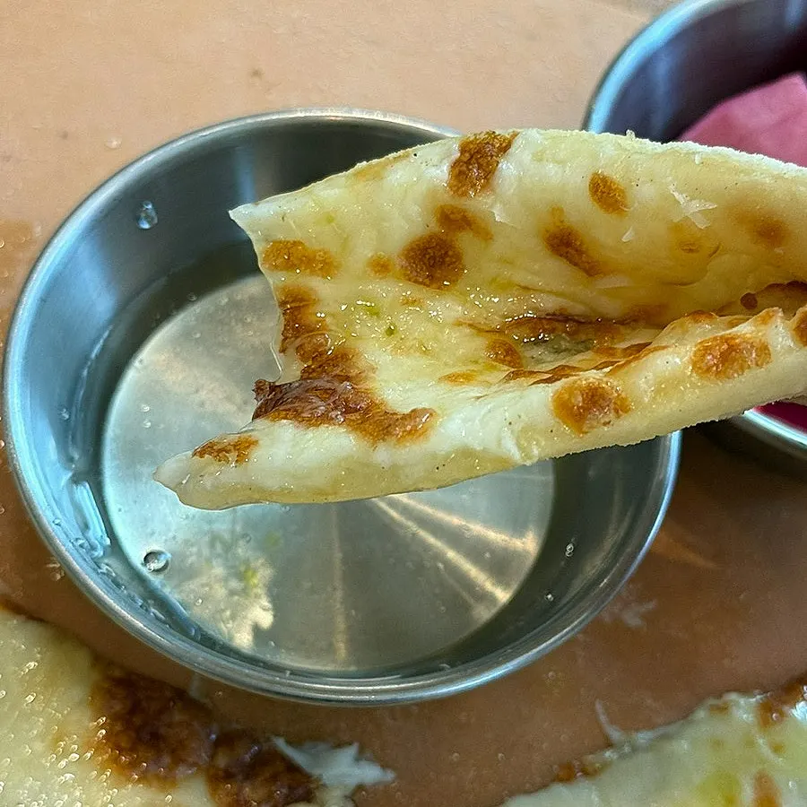 Gorgonzola cheese pizza dipped in honey