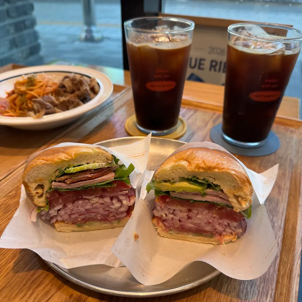 A plate of Withwich's avocado arugula sandwich