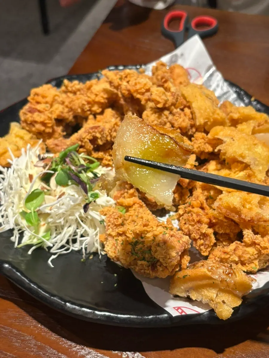 Whole fried onion served with the chicken