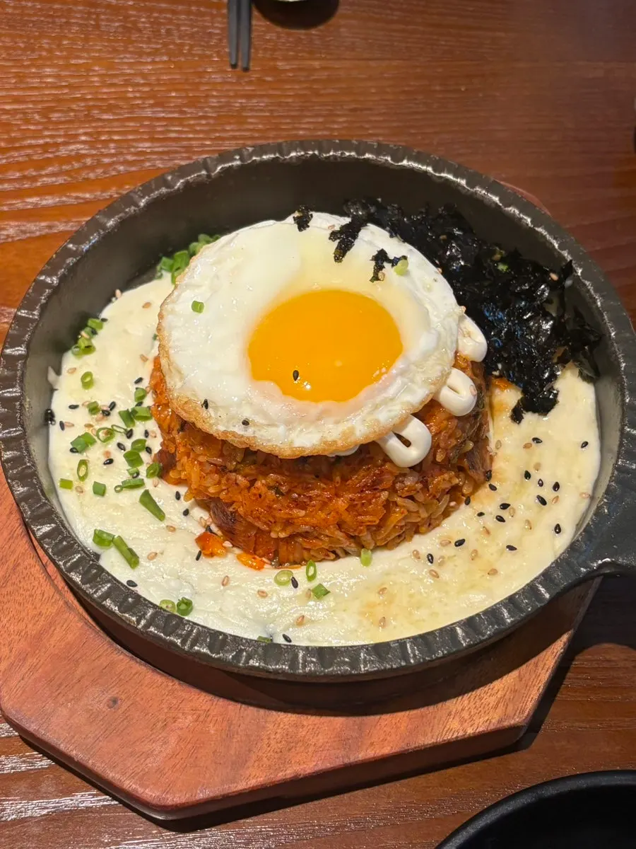 Pan-fried kimchi cheese pilaf topped with cheese