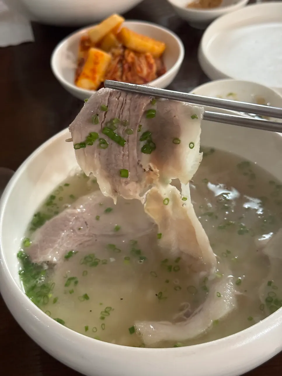 A bowl of pork gomtang eaten together with rice