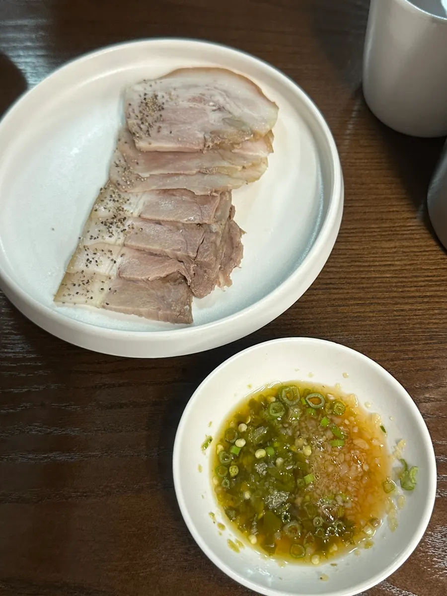 Half plate of cold pork served with sauce