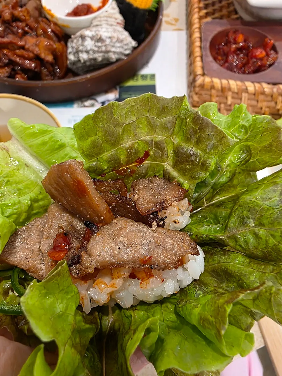 Seafood pajeon with 8 side dishes on the table