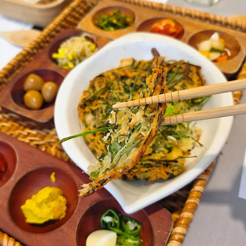 Side dishes including quail eggs and bean sprout salad