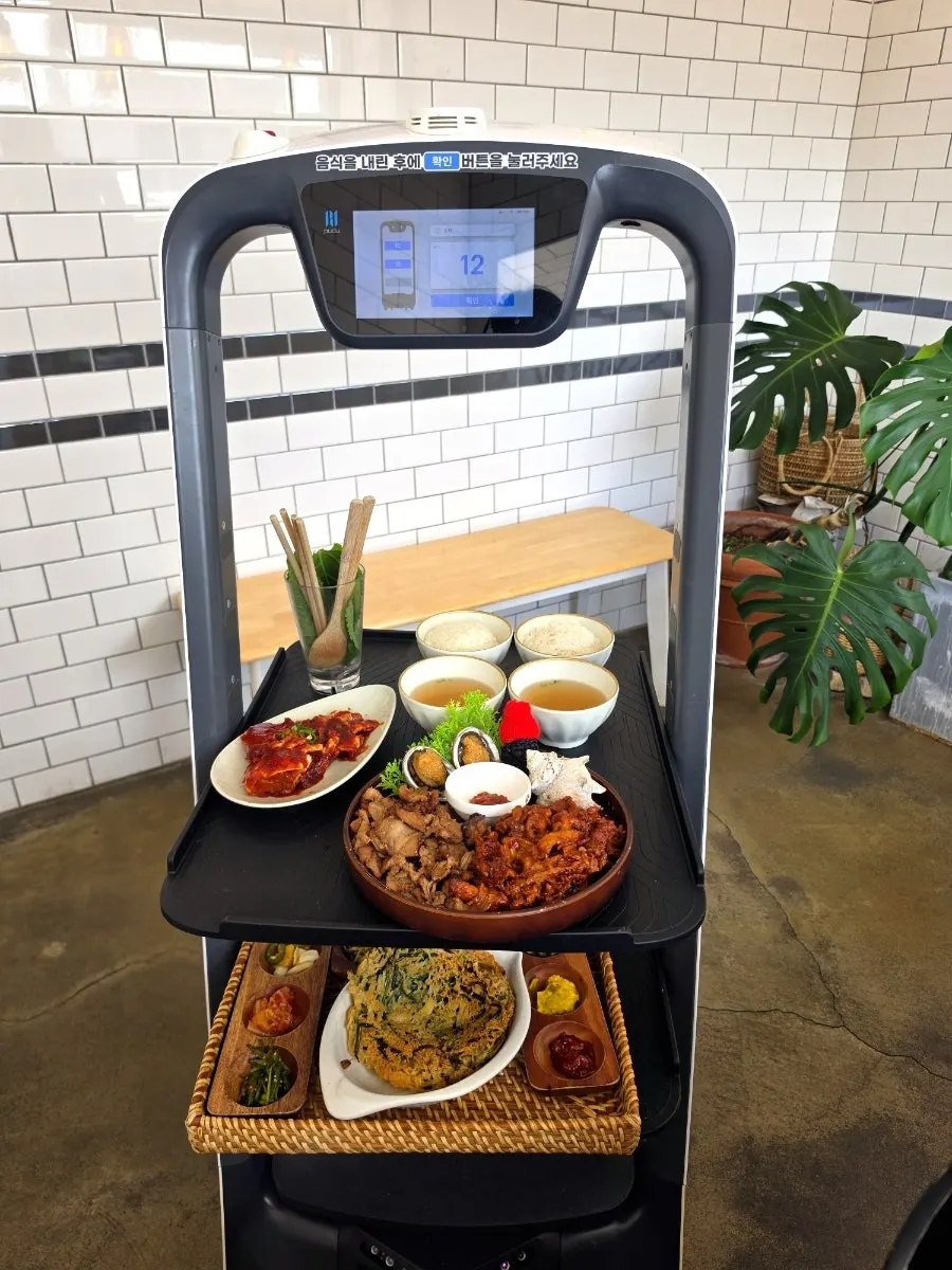 A serving robot delivering food