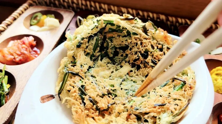 Half portion of seafood pancake included in the set