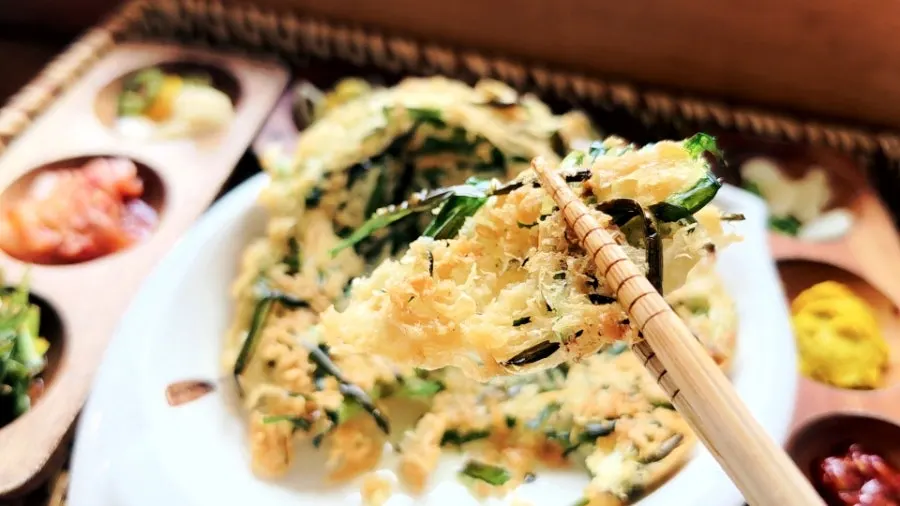 Seafood pancake served alongside the meat