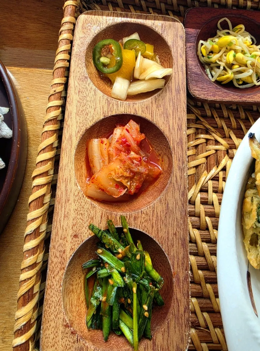 Various side dishes including braised quail eggs